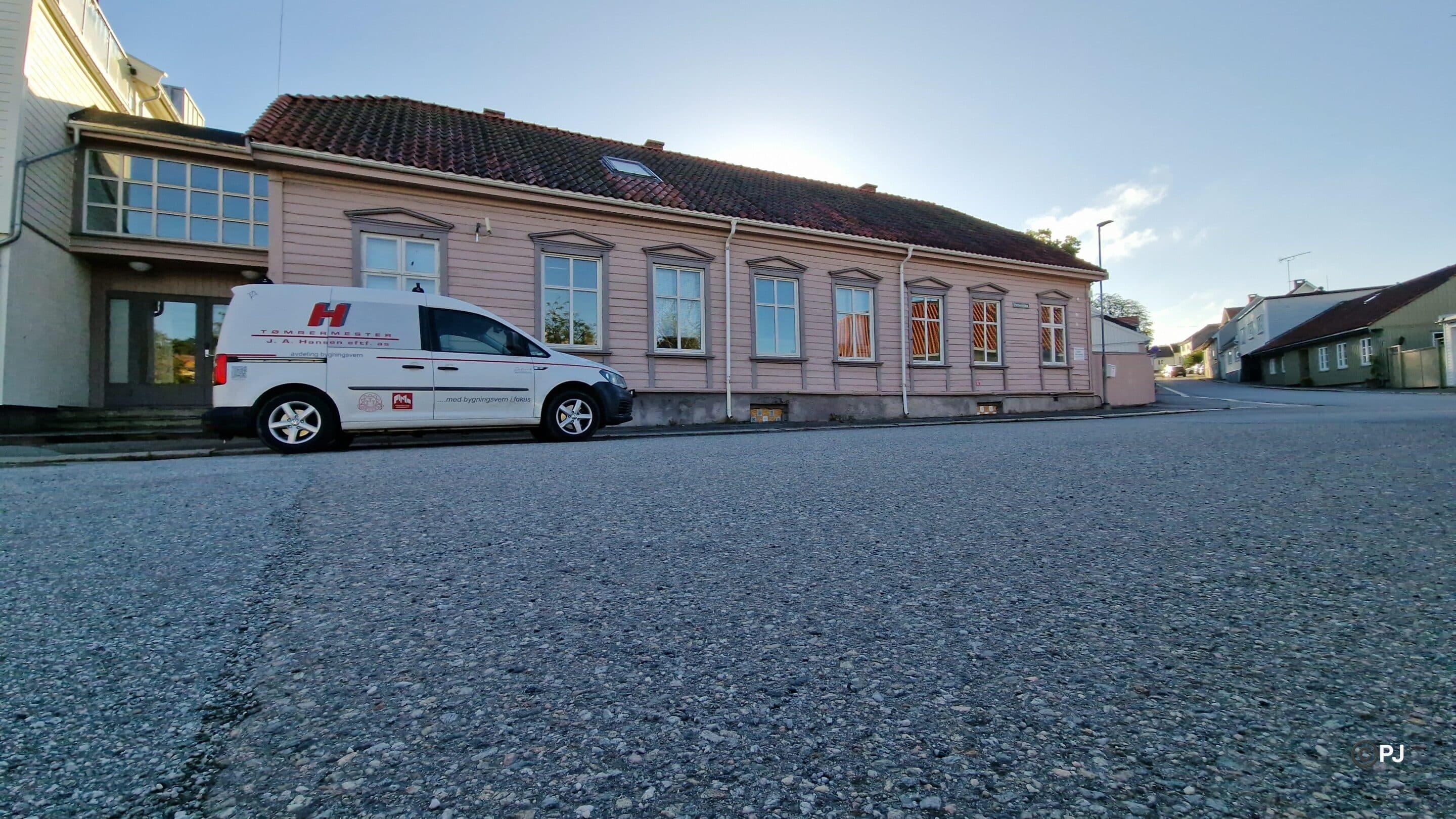 Their workshop building in Halden, with the firm's white van outside